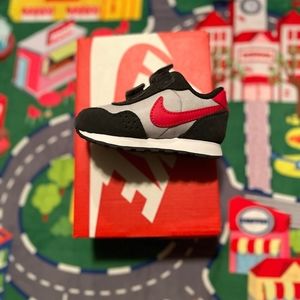Nike size 4 infant shoes in the color Grey fog/ university red.